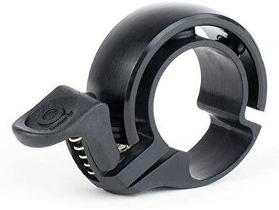 Knog Oi Bike Bell - Original & Luxe Styles, Built in Cable-Clip, Adult/Youth Bicycle Bell (Black, Copper, Brass, Aluminum)